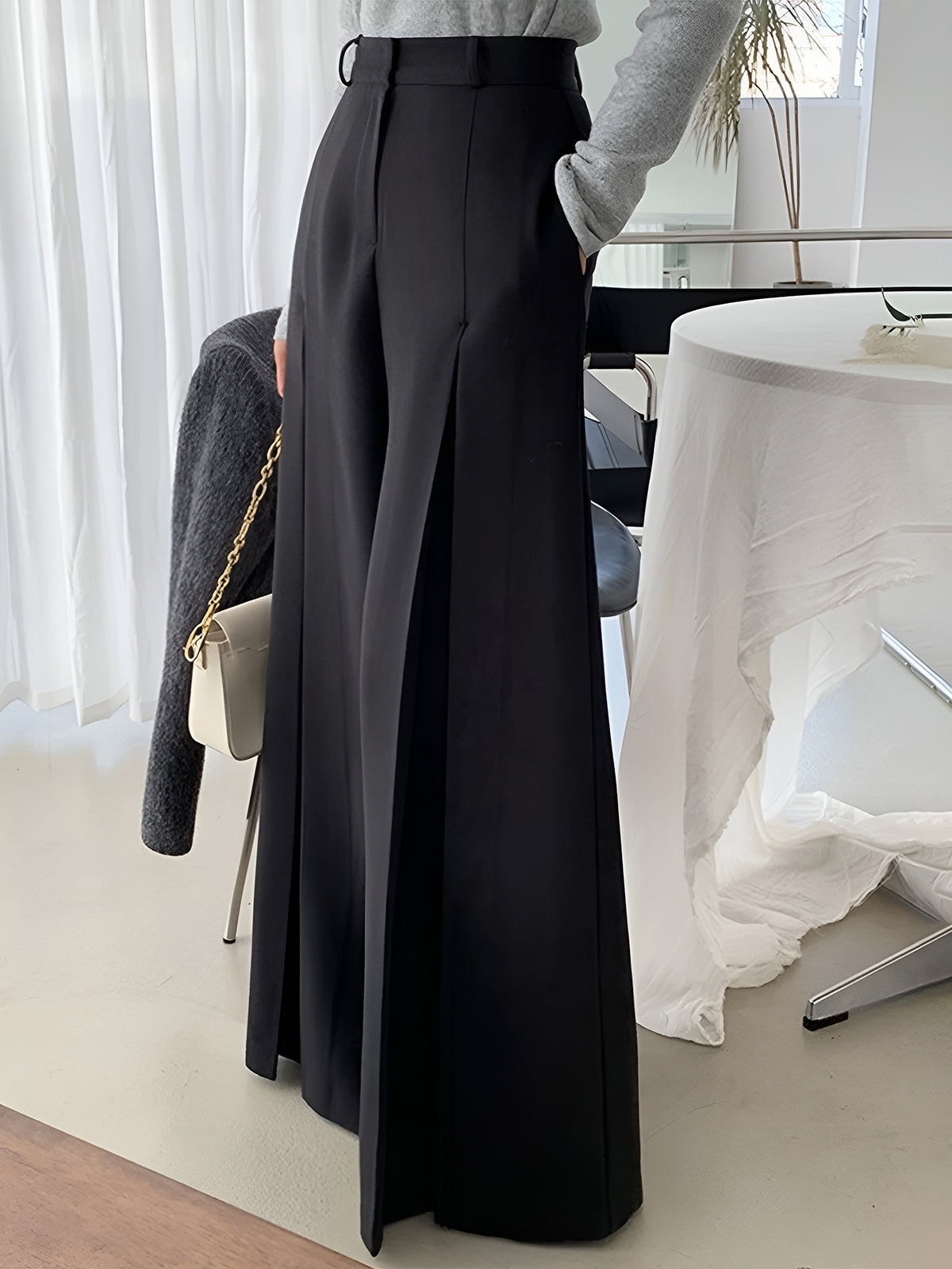 Hochtaillierte Faltenweite Hose