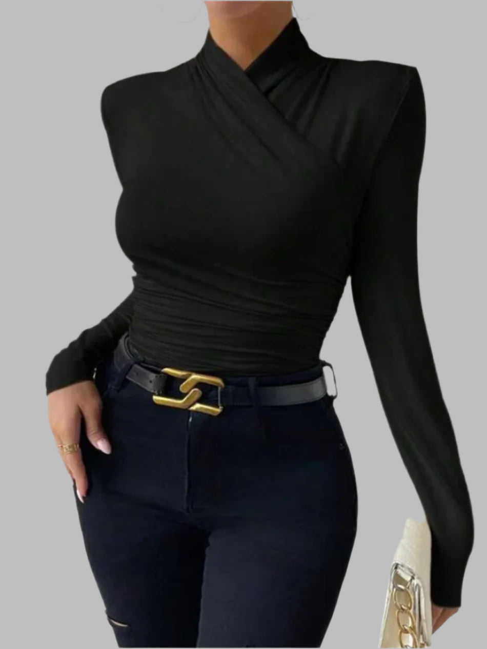 Faltige Langarmtop mit Slim-Fit-Effekt.