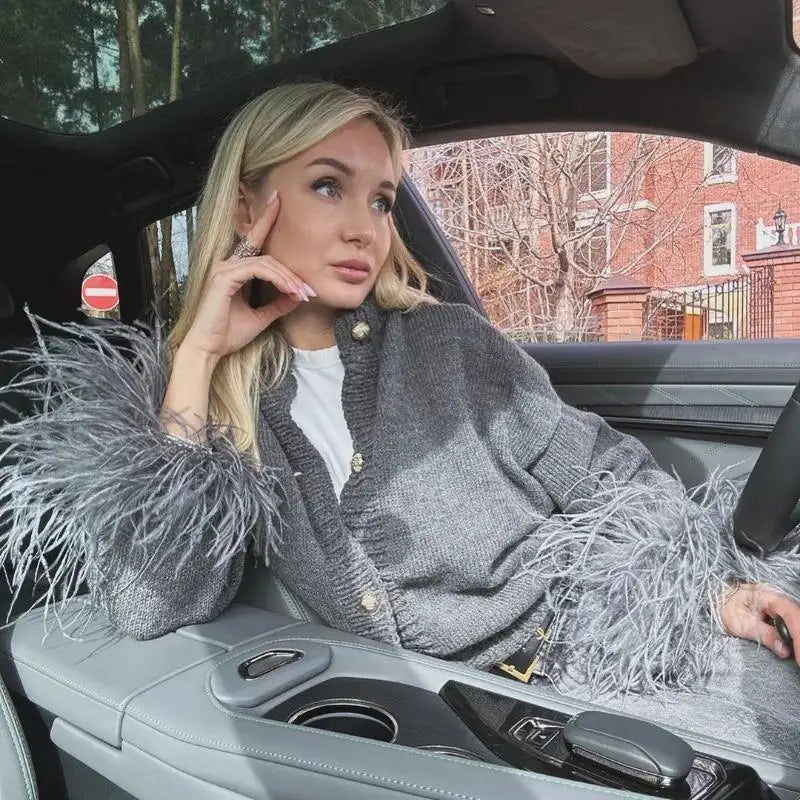 Raya- Samtjacke mit Federmanschetten