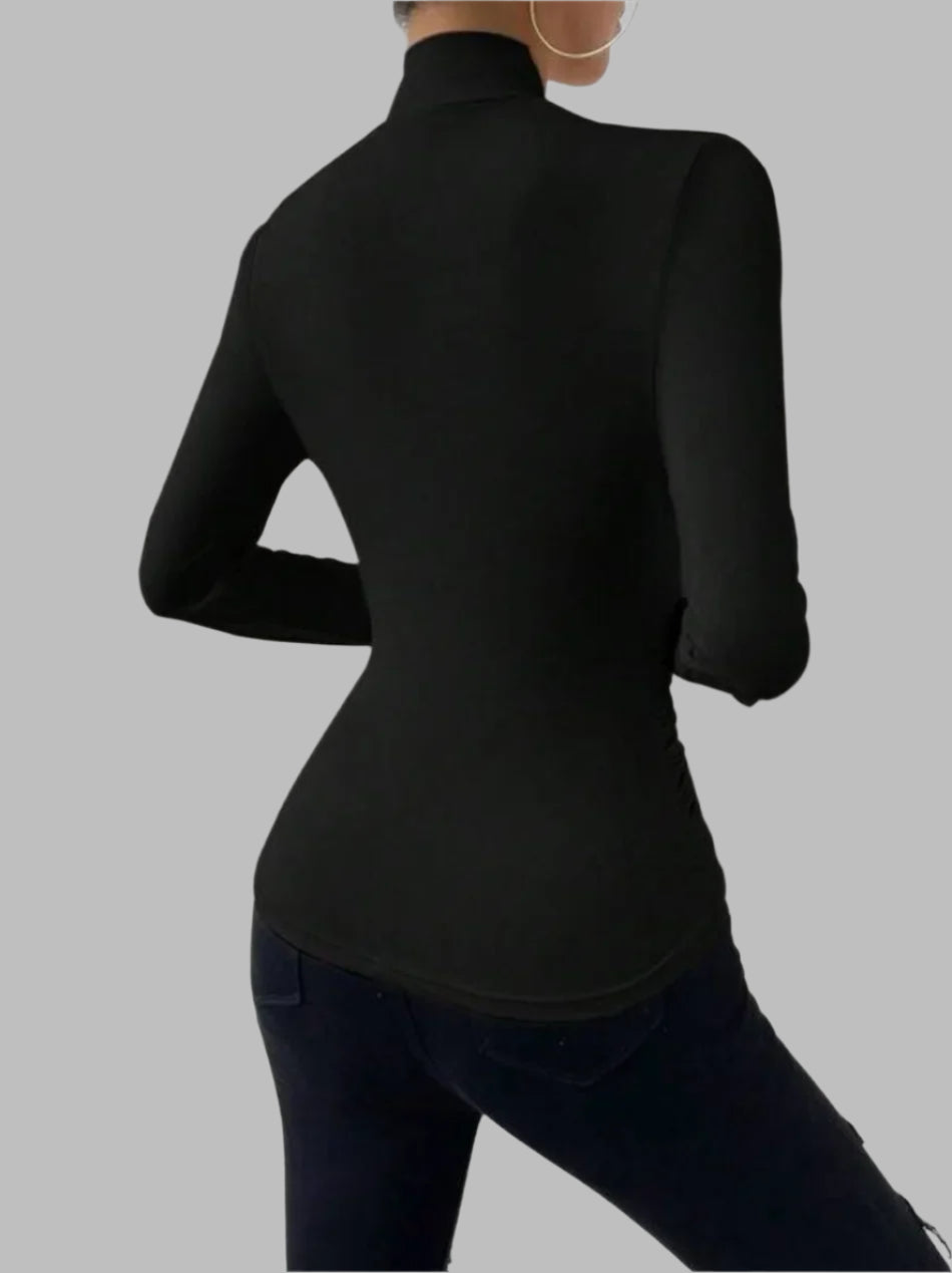 Faltige Langarmtop mit Slim-Fit-Effekt.