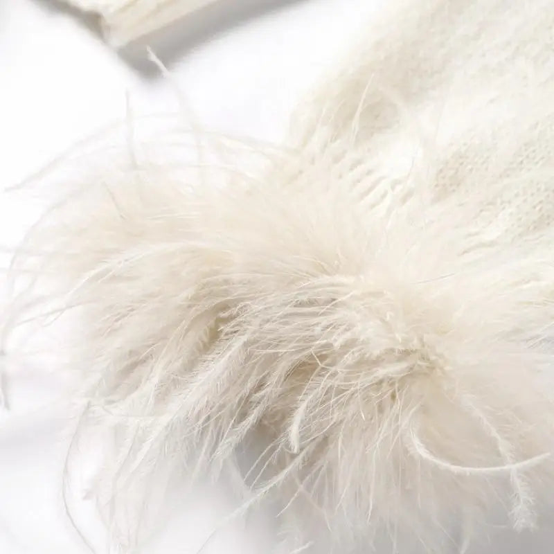 Raya- Samtjacke mit Federmanschetten